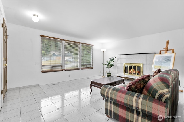 802 39th Pl, Bellingham, WA 98229 - living area featuring light tile patterned floors and a tile fireplace