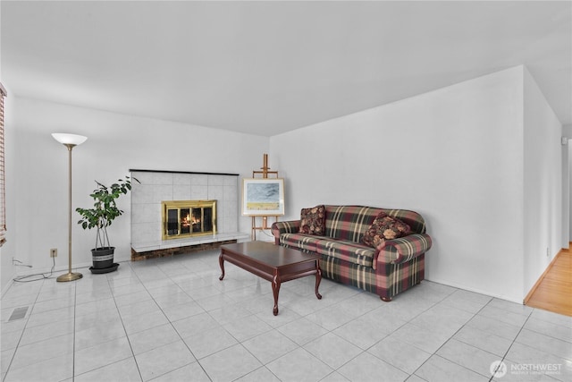 802 39th Pl, Bellingham, WA 98229 - living area with light tile patterned floors and a fireplace