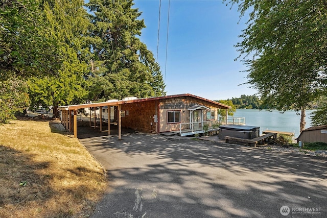 7519 Atchinson Dr SE, Olympia, WA 98513 - view of front of property featuring a water view