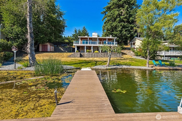7519 Atchinson Dr SE, Olympia, WA 98513 - dock area featuring a lawn and a water view