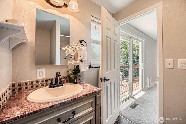 13601 SE 141st St, Renton, WA 98059 - bathroom with vanity and a textured wall