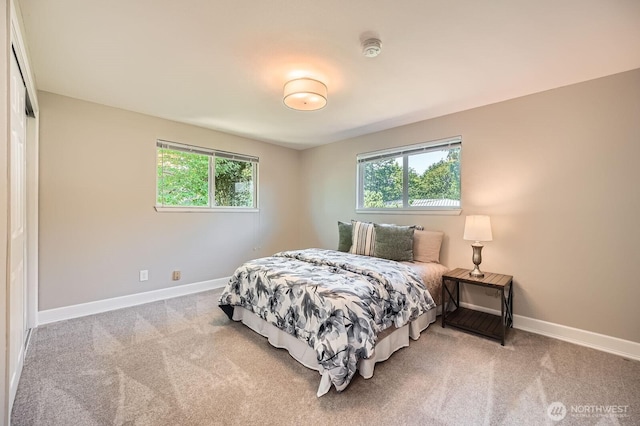 13601 SE 141st St, Renton, WA 98059 - bedroom featuring multiple windows and carpet flooring