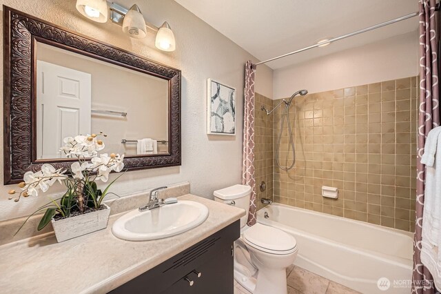 13601 SE 141st St, Renton, WA 98059 - full bathroom with shower / bathtub combination with curtain, vanity, a textured wall, and tile patterned floors