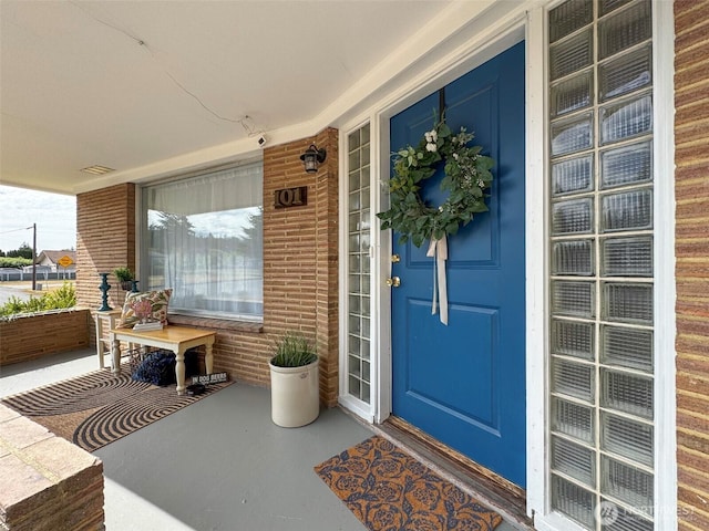 101 E Whidby Ave, Port Angeles, WA 98362 - doorway to property with a porch