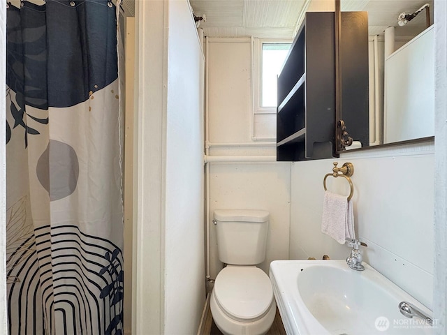 101 E Whidby Ave, Port Angeles, WA 98362 - bathroom with toilet and a shower with shower curtain