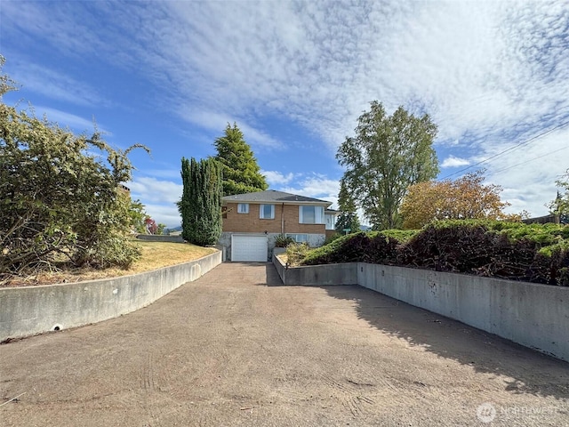 101 E Whidby Ave, Port Angeles, WA 98362 - view of front of house featuring driveway and an attached garage