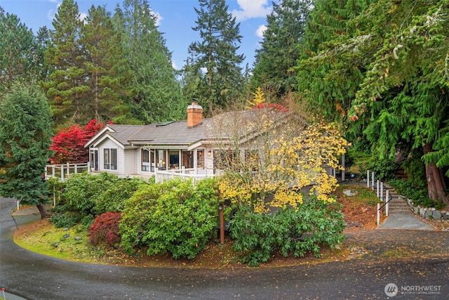 190 Bluffs Dr Unit 1, Port Townsend, WA 98368 - view of front of property with a chimney and stairs