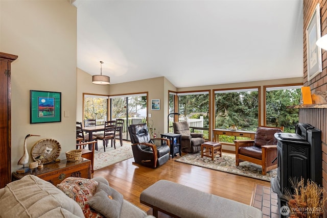 190 Bluffs Dr Unit 1, Port Townsend, WA 98368 - living area featuring wood finished floors and high vaulted ceiling