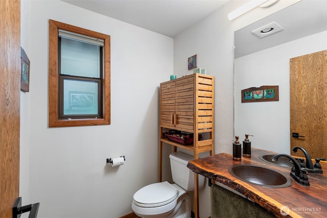 190 Bluffs Dr Unit 1, Port Townsend, WA 98368 - bathroom featuring toilet and vanity
