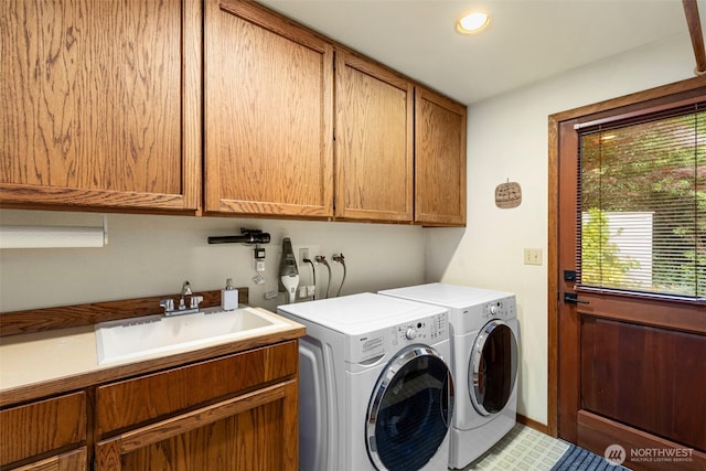 190 Bluffs Dr Unit 1, Port Townsend, WA 98368 - washroom featuring cabinet space, washer and dryer, and recessed lighting