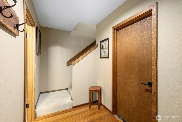 190 Bluffs Dr Unit 1, Port Townsend, WA 98368 - corridor featuring light wood-style flooring and baseboards