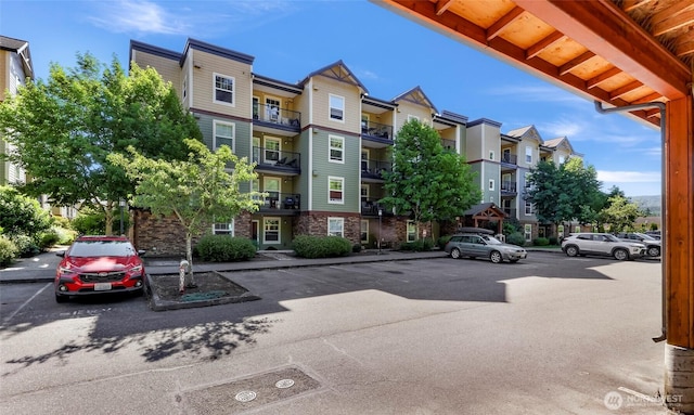 690 32nd St Unit B210, Bellingham, WA 98225 - view of building exterior featuring uncovered parking