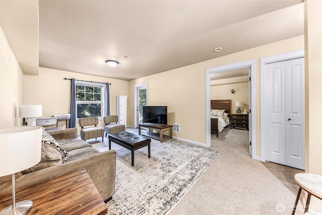 690 32nd St Unit B210, Bellingham, WA 98225 - living room with light carpet and baseboards