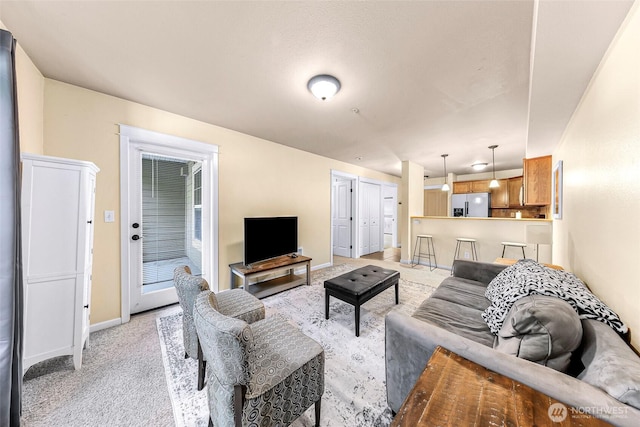 690 32nd St Unit B210, Bellingham, WA 98225 - living area featuring light carpet and baseboards