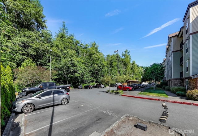 690 32nd St Unit B210, Bellingham, WA 98225 - view of asphalt road with street lighting, curbs, and sidewalks