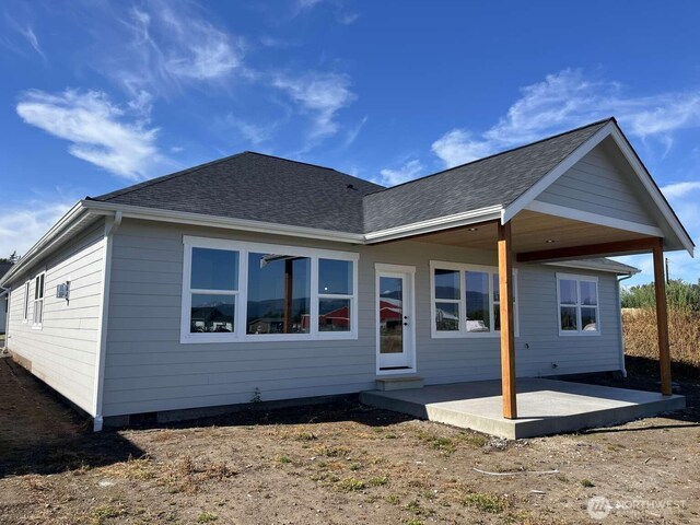 2080 Bowfin Way, Lynden, WA 98264 - rear view of house with a patio and roof with shingles