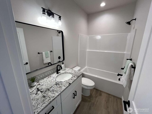 2080 Bowfin Way, Lynden, WA 98264 - bathroom with vanity, wood finished floors, and bathing tub / shower combination