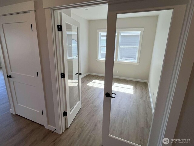 2080 Bowfin Way, Lynden, WA 98264 - hall featuring wood finished floors and baseboards