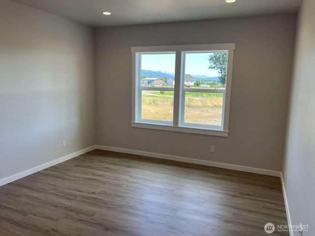 2080 Bowfin Way, Lynden, WA 98264 - spare room featuring dark wood finished floors and recessed lighting