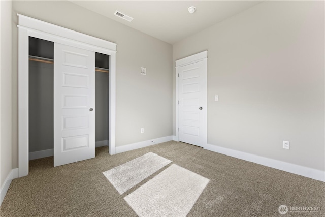 1517 7th Ave NE, Quincy, WA 98848 - unfurnished bedroom featuring carpet flooring and a closet