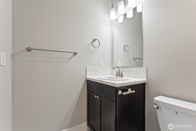 1517 7th Ave NE, Quincy, WA 98848 - bathroom featuring vanity and toilet