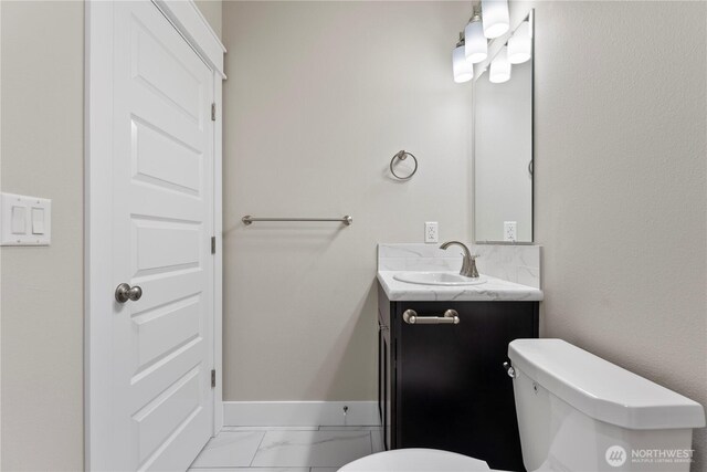 1517 7th Ave NE, Quincy, WA 98848 - bathroom with vanity and marble finish floors