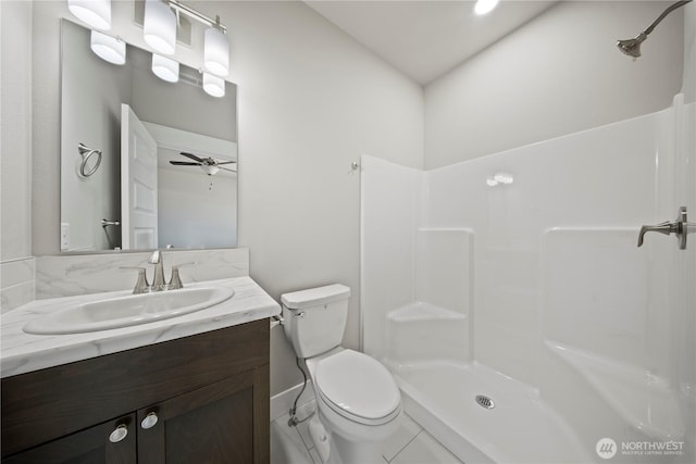 1517 7th Ave NE, Quincy, WA 98848 - bathroom featuring vanity, a shower, ceiling fan, and tile patterned floors