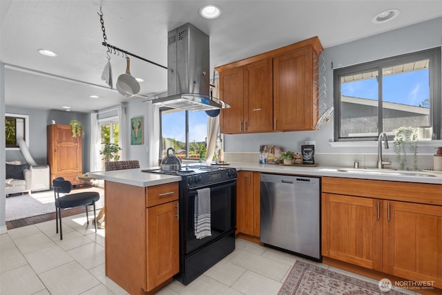 1214 E 61st St, Tacoma, WA 98404 - kitchen with stainless steel dishwasher, electric range, island range hood, a peninsula, and light countertops