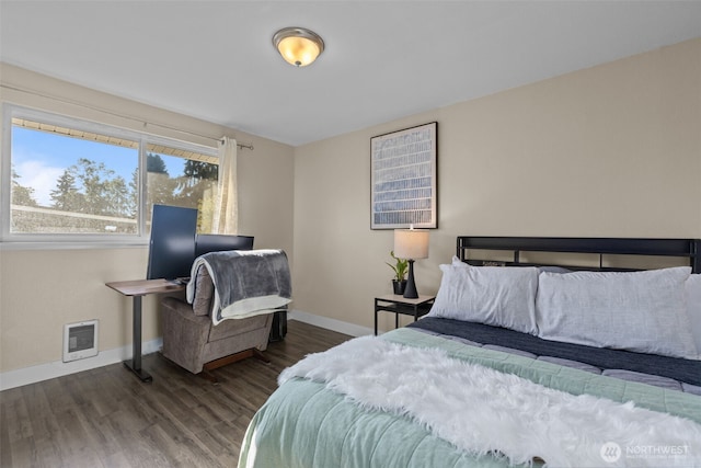 1214 E 61st St, Tacoma, WA 98404 - bedroom with wood finished floors and heating unit