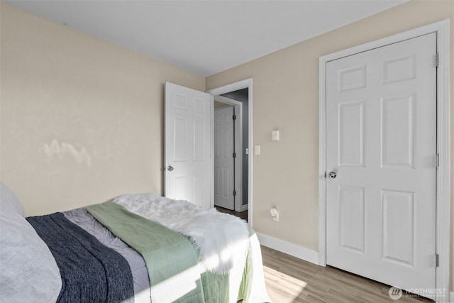 1214 E 61st St, Tacoma, WA 98404 - bedroom with wood finished floors and baseboards