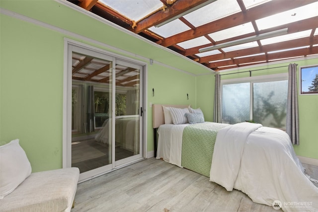 1214 E 61st St, Tacoma, WA 98404 - bedroom featuring wood finished floors and access to outside