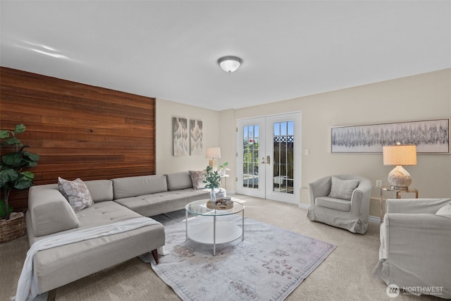 1214 E 61st St, Tacoma, WA 98404 - living area featuring french doors, carpet floors, and wood walls