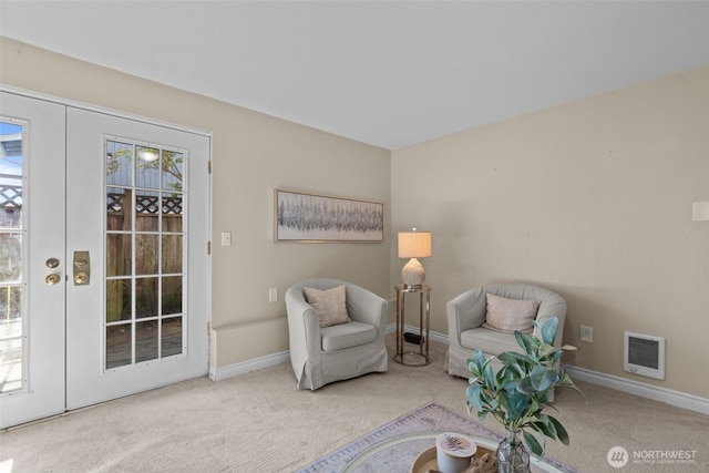 1214 E 61st St, Tacoma, WA 98404 - sitting room featuring carpet flooring, french doors, and heating unit