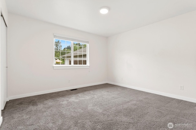 2016 3rd Ct SE, Auburn, WA 98002 - unfurnished bedroom featuring carpet flooring and a closet
