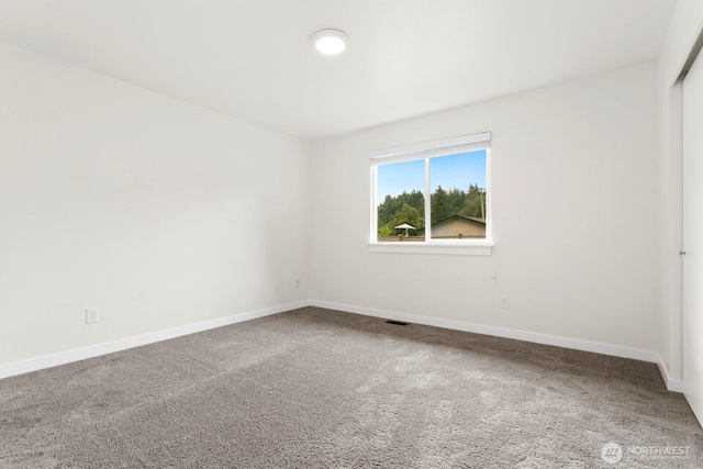 2016 3rd Ct SE, Auburn, WA 98002 - carpeted spare room with baseboards