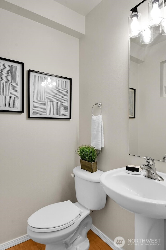 1542 15th Ave S Unit A, Seattle, WA 98144 - half bath featuring toilet and wood finished floors