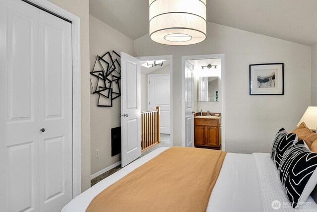 1542 15th Ave S Unit A, Seattle, WA 98144 - bedroom featuring vaulted ceiling and ensuite bathroom