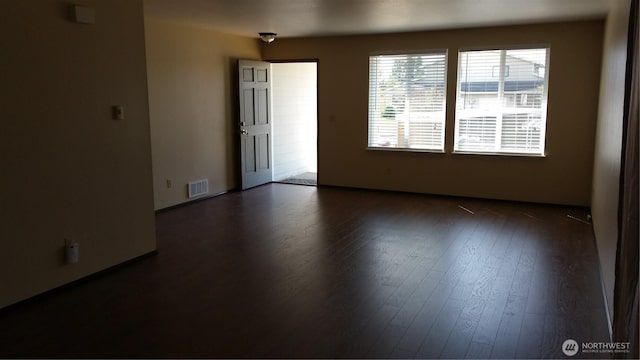 906 S 22nd Ct, Mount Vernon, WA 98274 - unfurnished room with dark wood finished floors