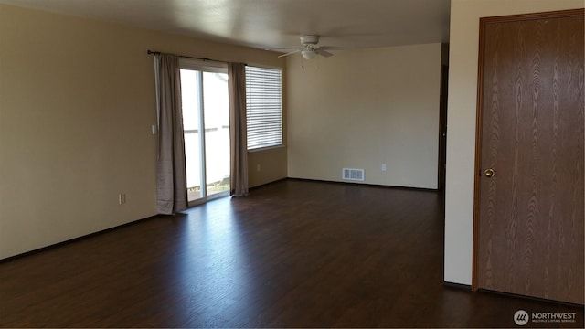 906 S 22nd Ct, Mount Vernon, WA 98274 - unfurnished room featuring a ceiling fan and dark wood-style floors
