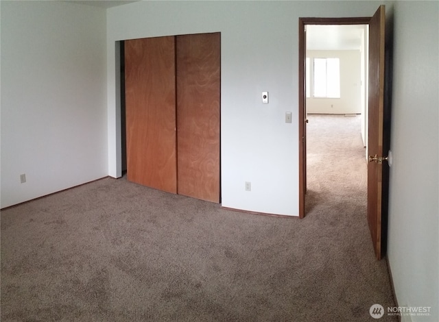 906 S 22nd Ct, Mount Vernon, WA 98274 - unfurnished bedroom with carpet and a closet