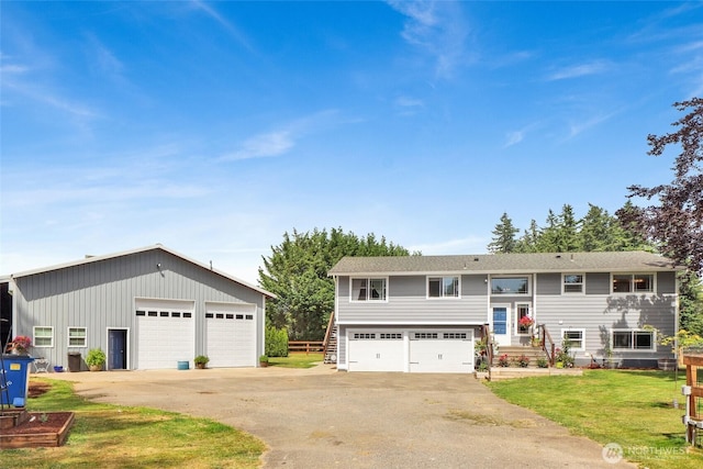 8984 Delta Line Rd, Custer, WA 98240 - split foyer home with a garage and a front lawn