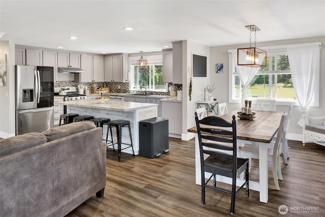 8984 Delta Line Rd, Custer, WA 98240 - kitchen with stainless steel appliances, gray cabinetry, decorative backsplash, a kitchen island, and recessed lighting