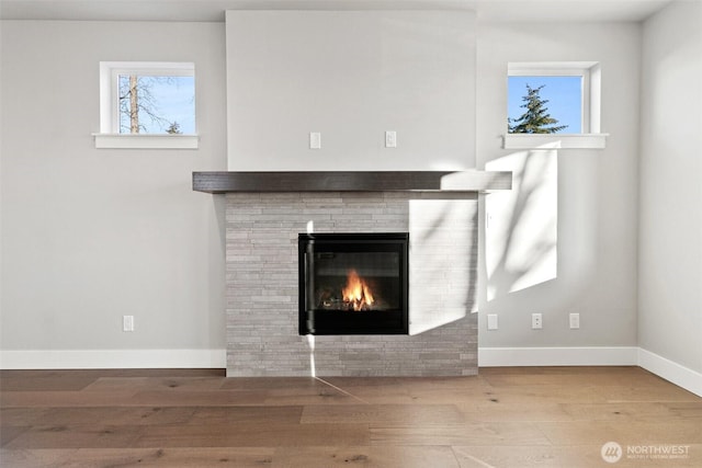 15627LOT15 SE 257th St, Covington, WA 98042 - detailed view of wood finished floors and a glass covered fireplace