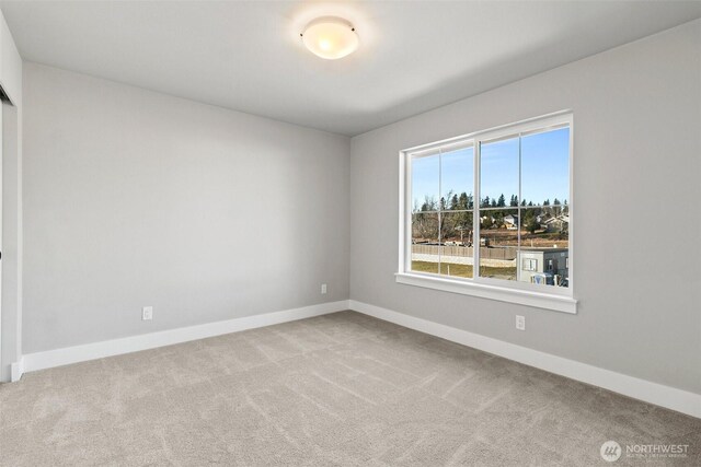 15627LOT15 SE 257th St, Covington, WA 98042 - carpeted spare room featuring baseboards