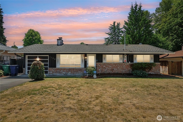1106 SE 26th St, Auburn, WA 98002 - ranch-style home featuring brick siding, a chimney, driveway, a garage, and board and batten siding