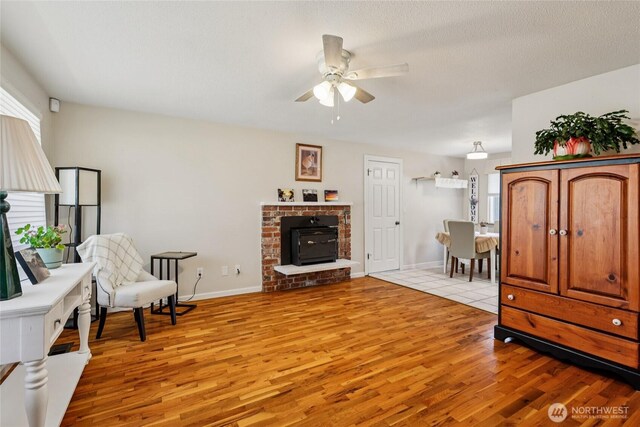 1106 SE 26th St, Auburn, WA 98002 - sitting room featuring light wood finished floors and a ceiling fan