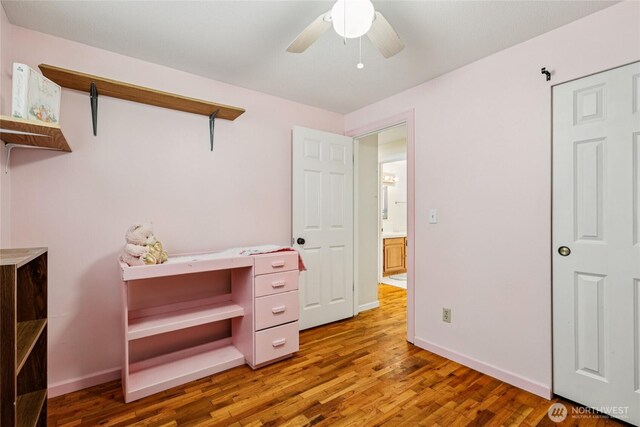 1106 SE 26th St, Auburn, WA 98002 - bedroom featuring wood finished floors and a ceiling fan