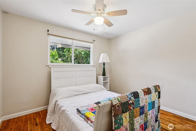 1106 SE 26th St, Auburn, WA 98002 - bedroom featuring wood finished floors and a ceiling fan