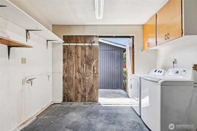 1106 SE 26th St, Auburn, WA 98002 - laundry room featuring cabinet space and washer and dryer