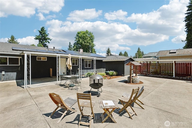 1106 SE 26th St, Auburn, WA 98002 - fenced backyard with a patio, a storage unit, and outdoor dining area